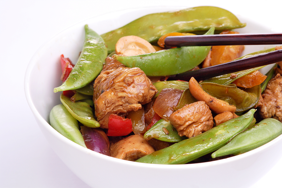 Close up of bowl of Chicken, Snap Pea, and Mushroom Stir Fry