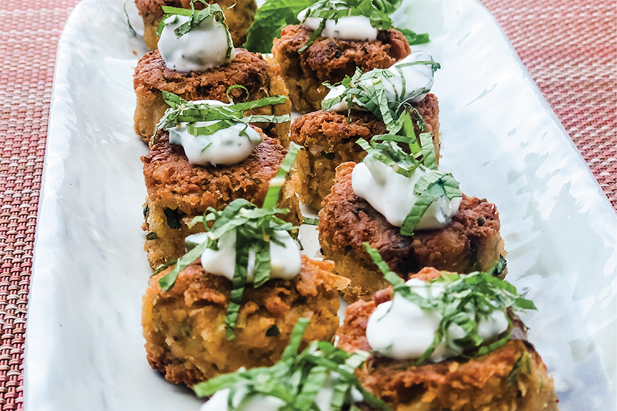 Chickpea Cilantro Lime Fritters lined up in 2 rows on a platter