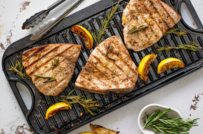 3 swordfish fillets on a grill pan