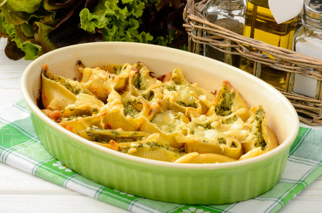 Baking dish with Stuffed Shells with White Bean "Cheese" Sauce