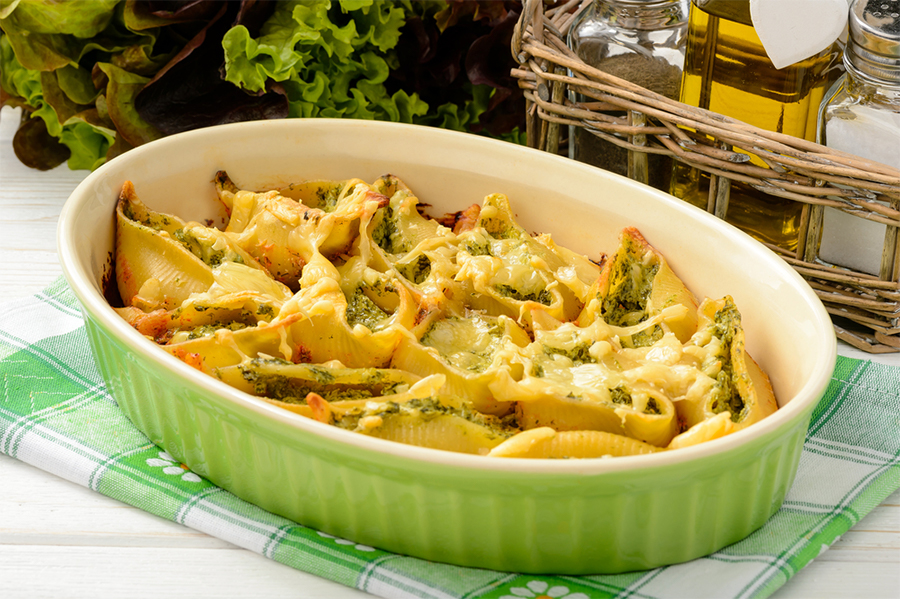 Baking dish with Stuffed Shells with White Bean "Cheese" Sauce
