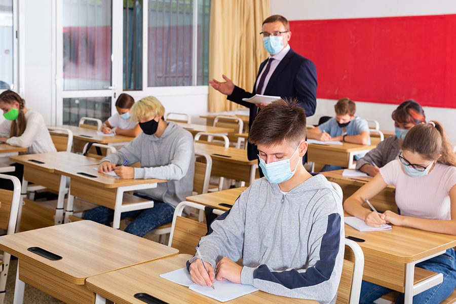 High school classroom with social distancing and masks
