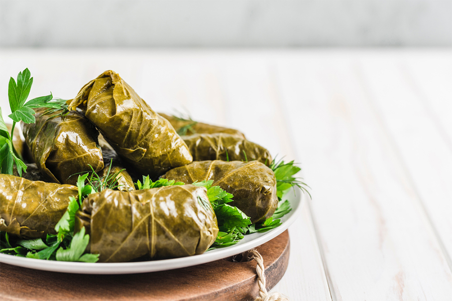Rice wrapped in Grape Leaves on a plate