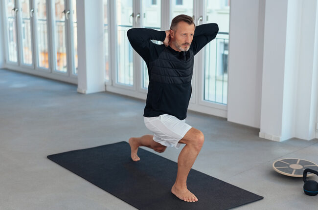 Man doing stretch and lunge exercises