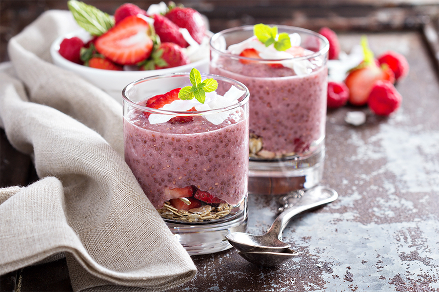 2 glass jars with strawberry chia pudding