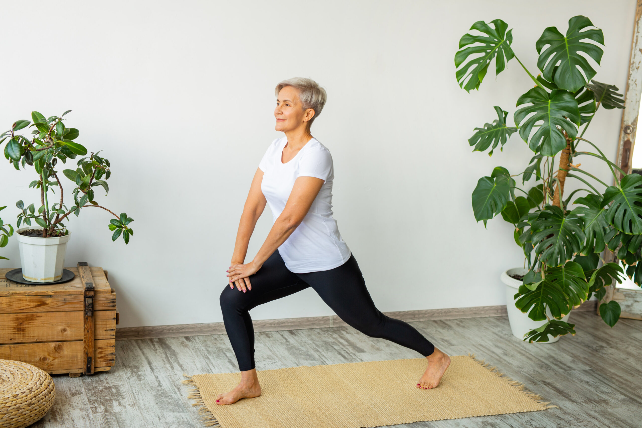 One man doing guided meditation yoga self care practice at home