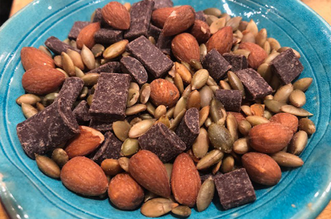 Trail mix with chocolate, almonds and pumpkin seeds