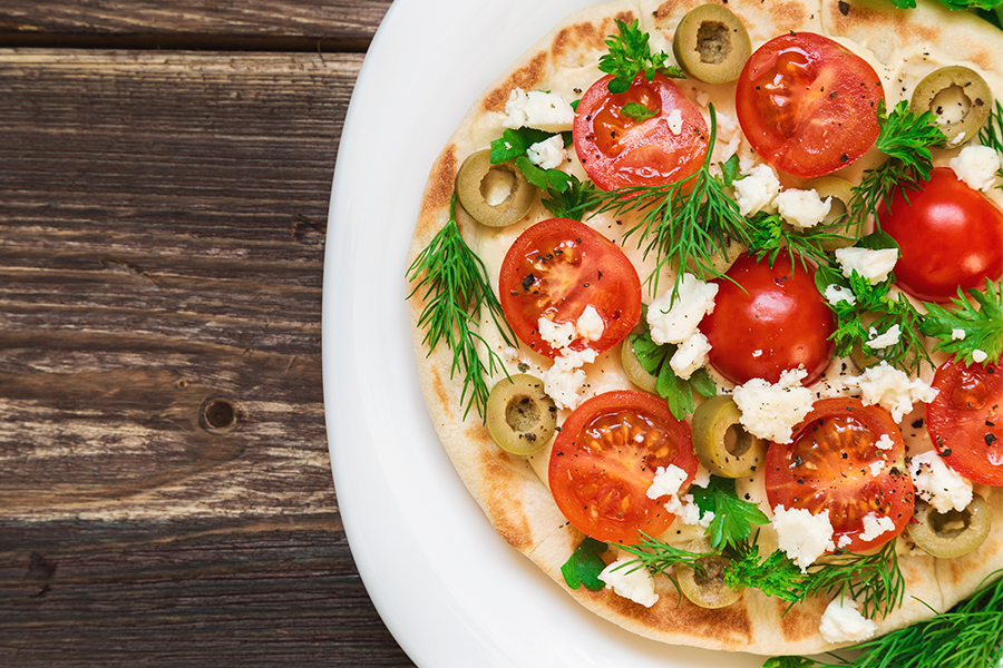 Pita Bread Pizza with tomatoes, olives, cheese