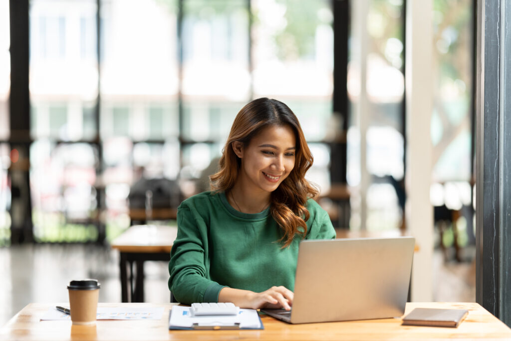 woman looking at computer